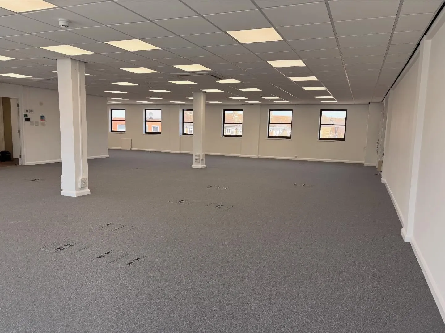 Completed office floor in Weybridge with new LED panel lighting and floor boxes